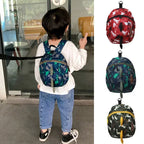 Children's anti-loss safety backpack with dinosaur-shaped safety belt.