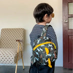 Children's anti-loss safety backpack with dinosaur-shaped safety belt.