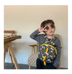 Children's anti-loss safety backpack with dinosaur-shaped safety belt.