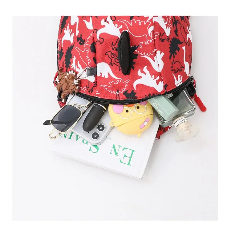 Children's anti-loss safety backpack with dinosaur-shaped safety belt.